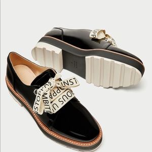 Zara patent brogues with printed bow